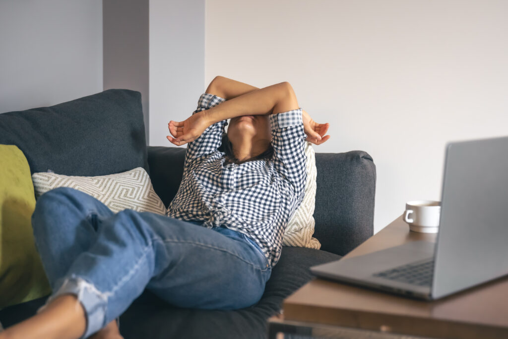 tired from work young woman front laptop